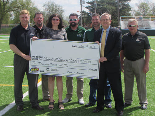 Mercer Savings Bank donates check for Greenville’s Friends of Harmon Field project