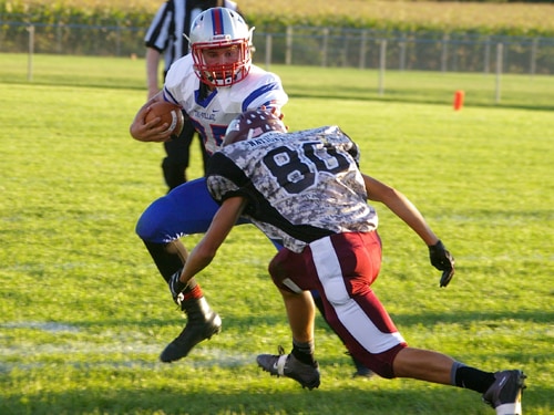 Wes-Del overpowers the Tri-Village football team