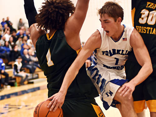 Franklin Monroe boys basketball team loses in overtime to Troy Christian